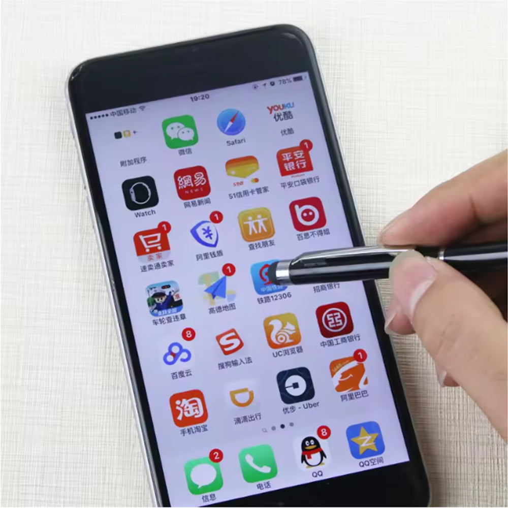MicroWorld 2-in-1 stylus and ballpoint pen in black (0.7mm) used on a smartphone screen.