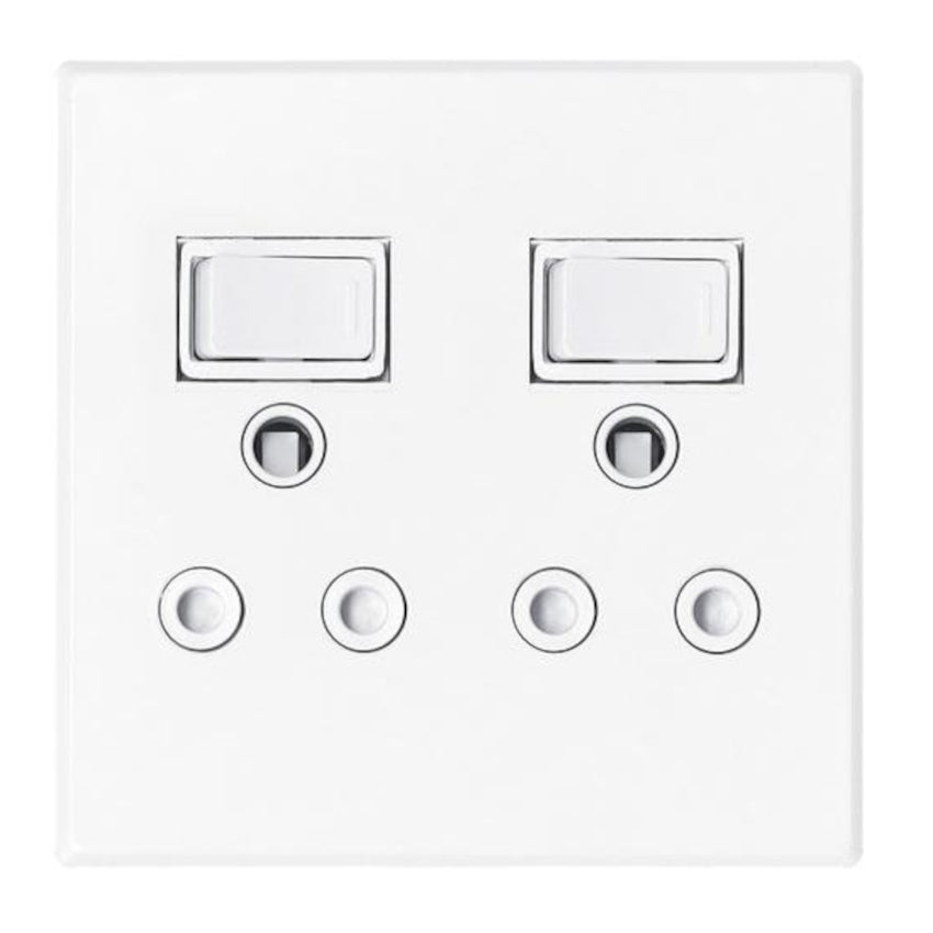 White wall switch panel with two rectangular switches and four circular sockets on a white background
