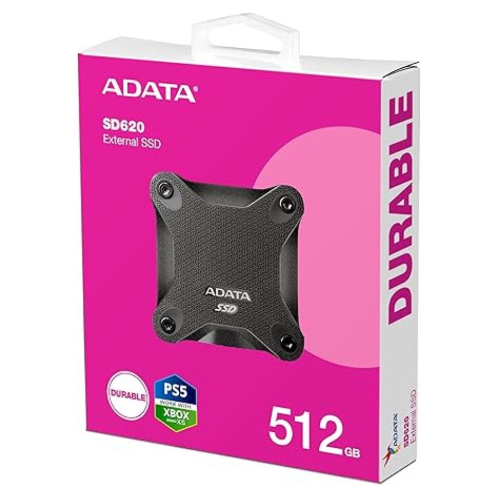 ADATA SD620 512GB SSD placed next to a laptop for size comparison