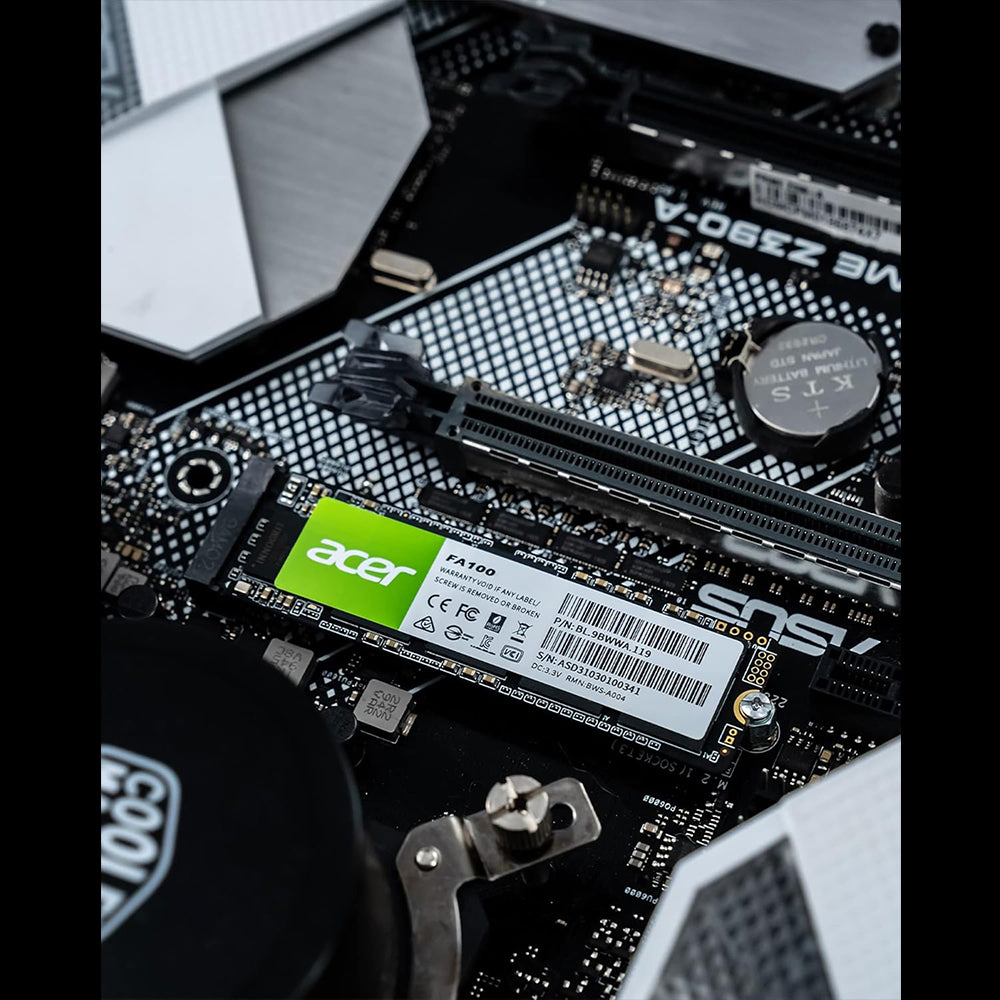Acer FA100 2TB M.2 NVMe SSD installed in a PC motherboard, PCIe Gen3 x4, up to 3300MB/s.
