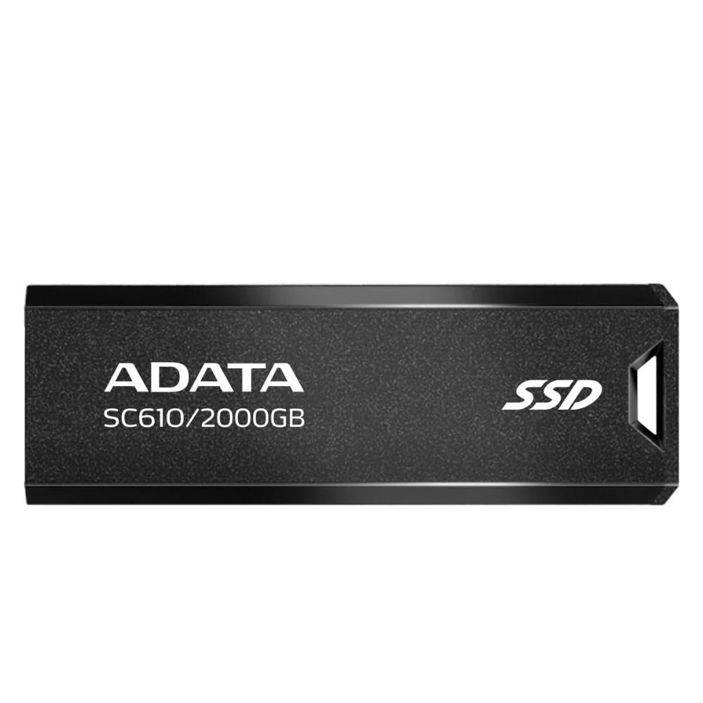 Compact 2TB SSD flash drive placed on desk with mobile devices