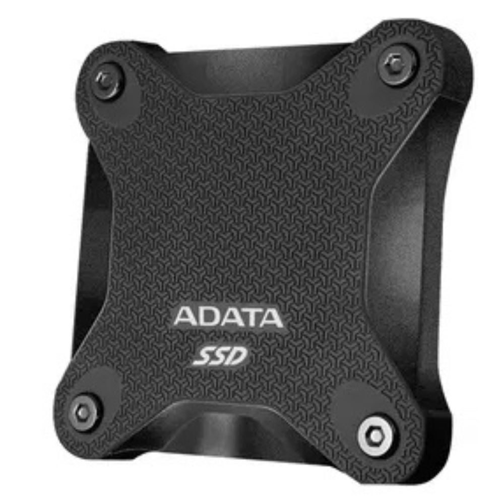 ADATA SD620 rugged SSD next to gaming console and laptop