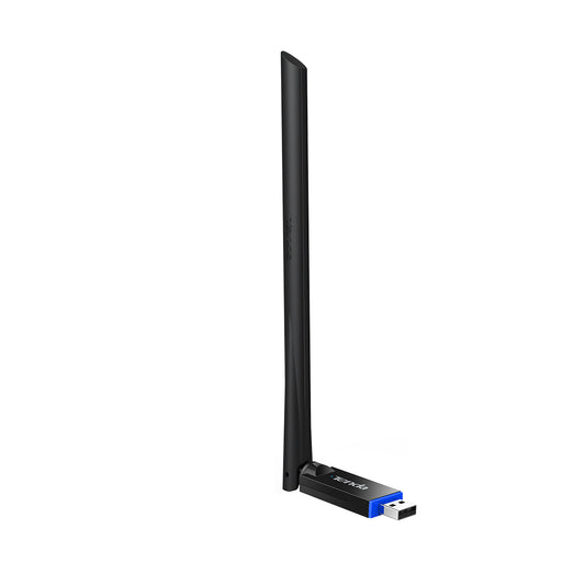 The adapter plugged into a laptop's USB port.