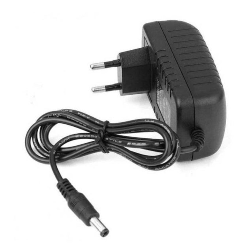Black power adapter with plug on a white background