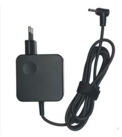 Black power adapter with cable on a white background