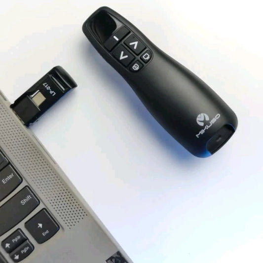 Mikuso Black laser pointer and USB receiver on a laptop with a white background