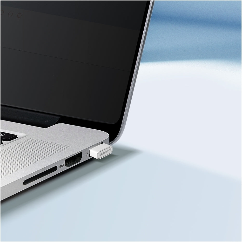 Mercusys MW150US plugged into a laptop USB port, showing compact size and seamless plug-and-play connectivity.