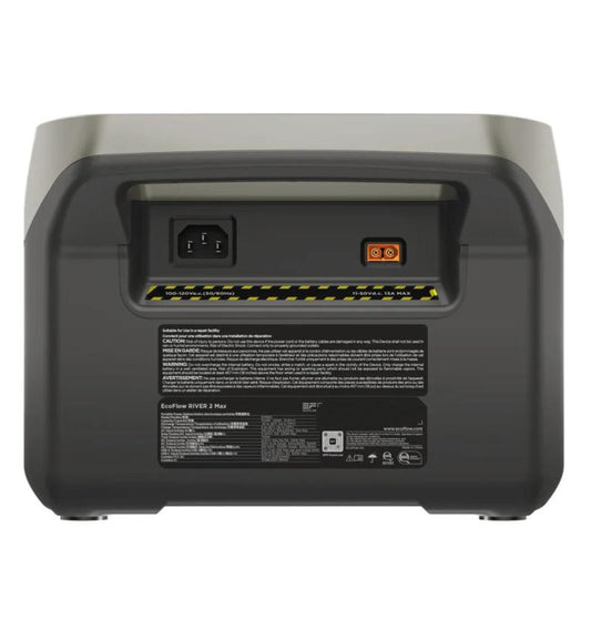 Back view of a power station with connectors and warning label on a white background