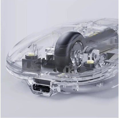 Close-up view of a transparent mouse highlighting the scroll wheel mechanism and the Type-C charging port.
