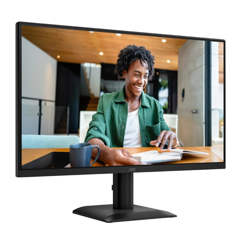 Side angled display of the AOC 24E40L IPS Monitor displaying a woman in a green jacket using a computer in a home setting