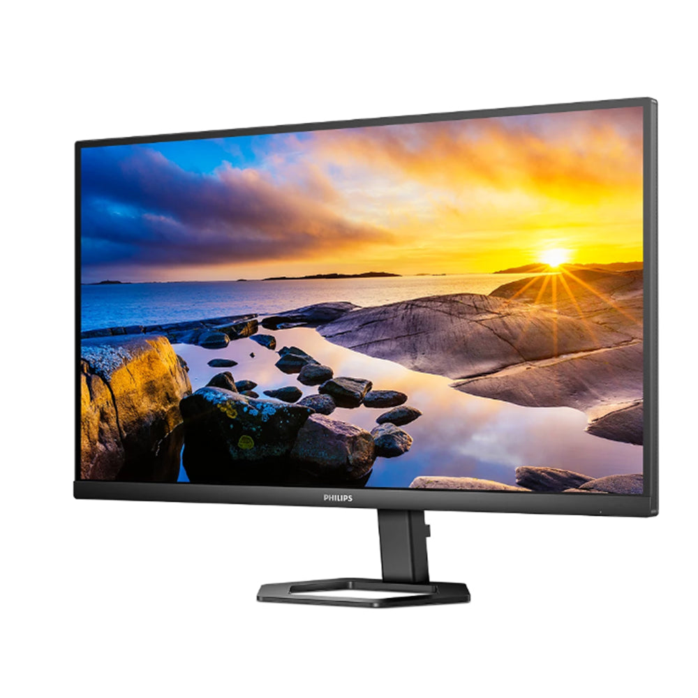 Philips 27-inch 4K UHD IPS HDR10 monitor on stand displaying a vivid sunset landscape.