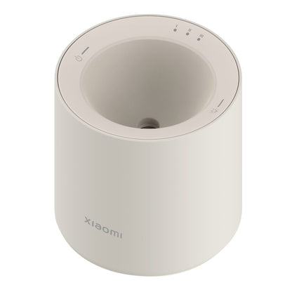 Top view of the Xiaomi Smart Scent Diffuser showing the air outlet and indicator lights