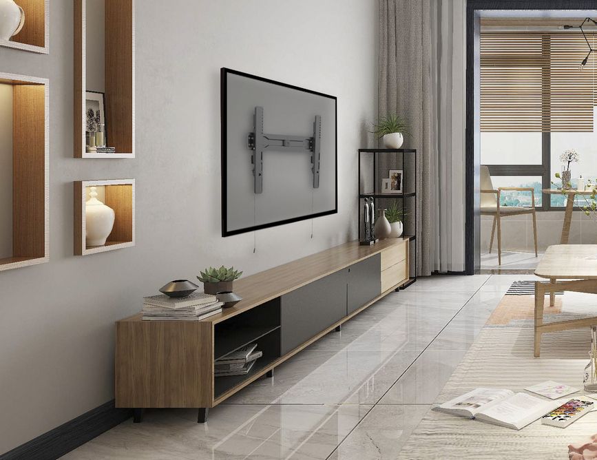 Modern living room with a television mounted on the wall and a wooden entertainment console.