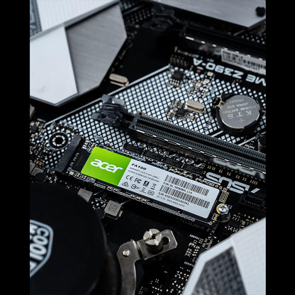 Acer FA100 2TB M.2 NVMe SSD installed in a PC motherboard, PCIe Gen3 x4, up to 3300MB/s.