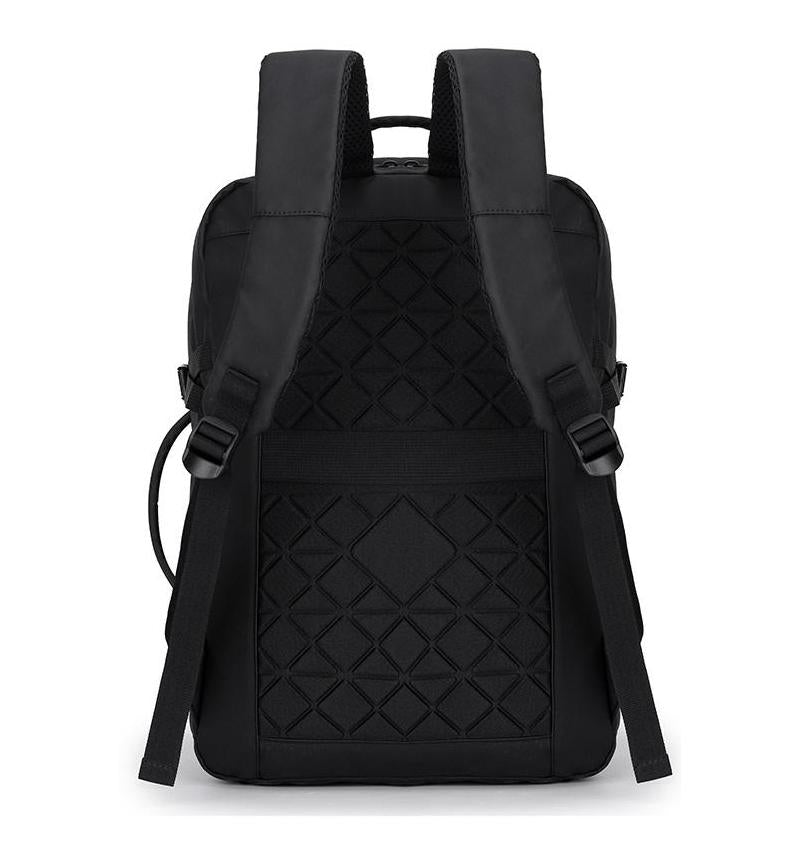 Back view of black adjustable laptop backpack showing padded shoulder straps and diamond-patterned breathable back panel for ergonomic comfort.