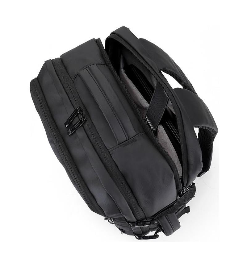 Top view of black adjustable laptop backpack showing padded laptop compartment and reinforced handles for secure carrying.