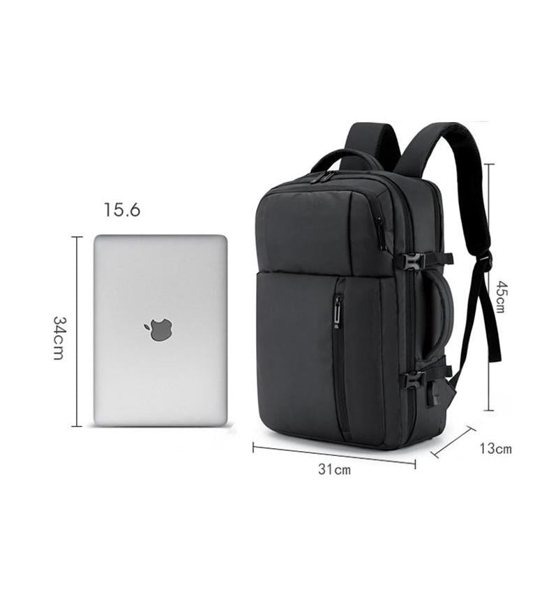 Black adjustable laptop backpack with 45×31×13 cm dimensions shown beside 15.6-inch laptop for size comparison – fits laptops up to 17 inches.