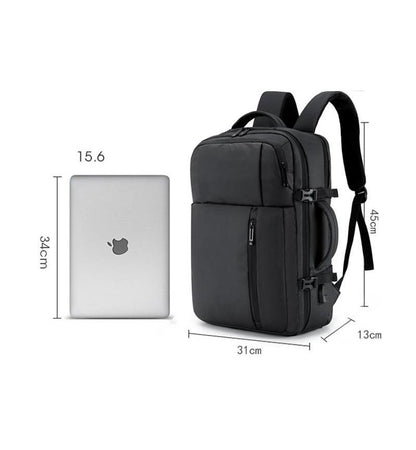 Black adjustable laptop backpack with 45×31×13 cm dimensions shown beside 15.6-inch laptop for size comparison – fits laptops up to 17 inches.