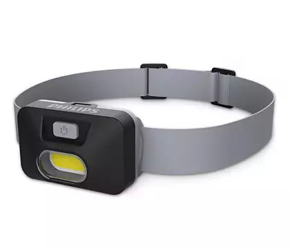Front view of the Philips SFL1000H/10 LED Headlamp showing its compact black light unit with grey elastic headband and power button on top