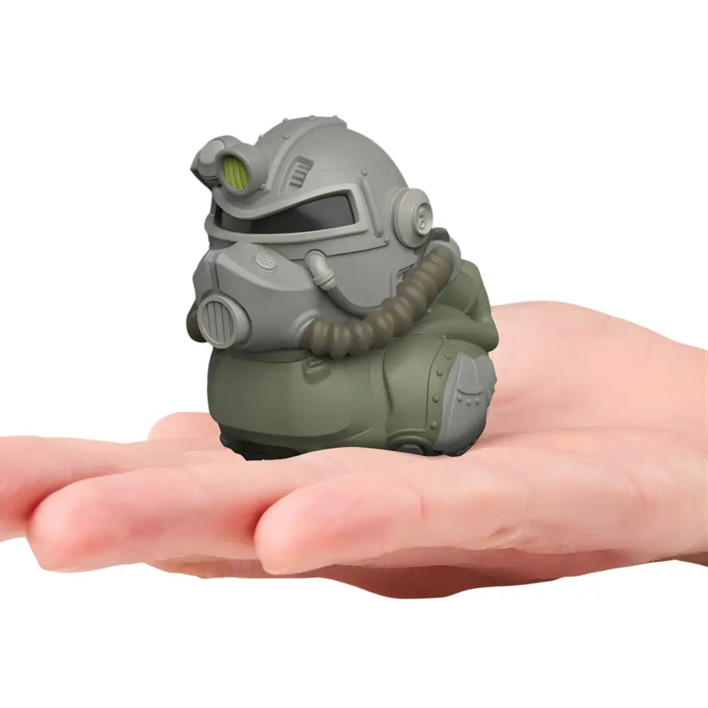 Tubbz Mini Fallout T-51 Armor in the shape of a duck on a hand against a white background
