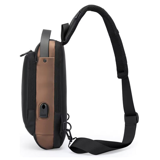 Side view of a Black and brown crossbody bag on a white background