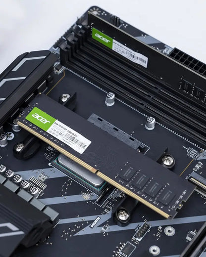 Acer RAM module installed on a computer motherboard with a white background