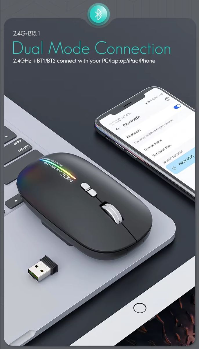 A black wireless mouse with a silver scroll wheel and RGB lighting, shown on a laptop next to a smartphone displaying Bluetooth connection settings, with a USB receiver nearby.