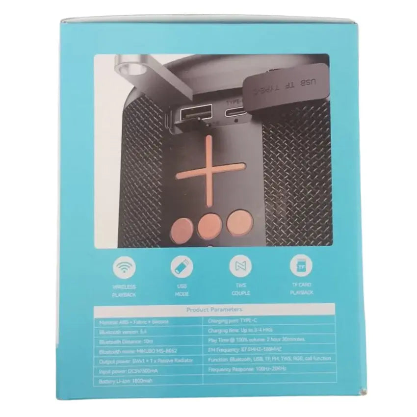 A light blue retail box for a portable Bluetooth speaker, showing a large photo window with a close-up of the black speaker and rose-gold control buttons, plus feature icons and product specifications below.