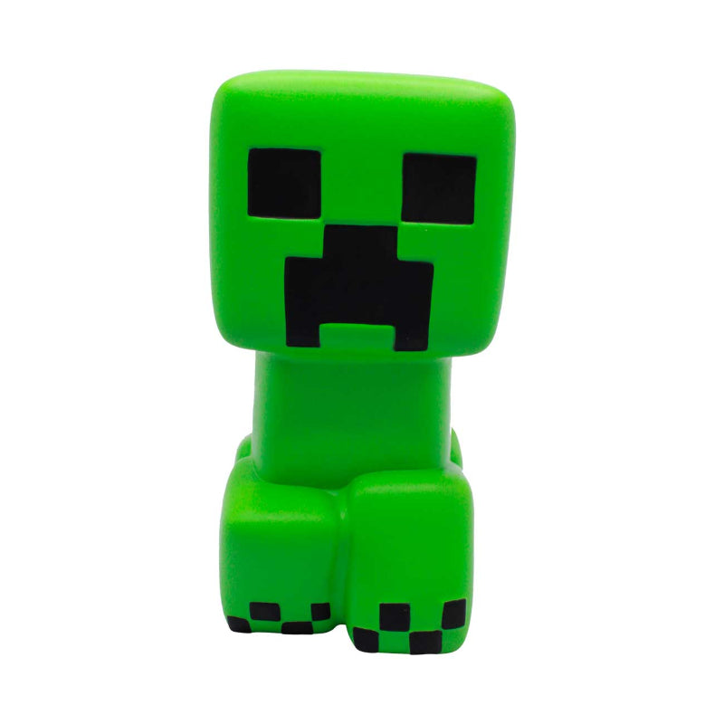 Green Minecraft creeper figure on a white background