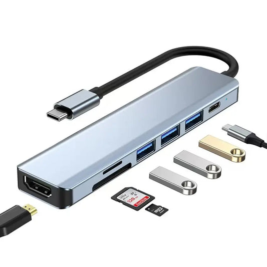 M-Link Multifunctional USB-C hub with various accessories on a white background