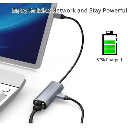 Computer with USB-C hub and cable, displaying 87% battery charge.