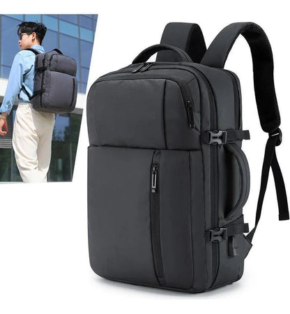 Black backpack with a person wearing it in the background