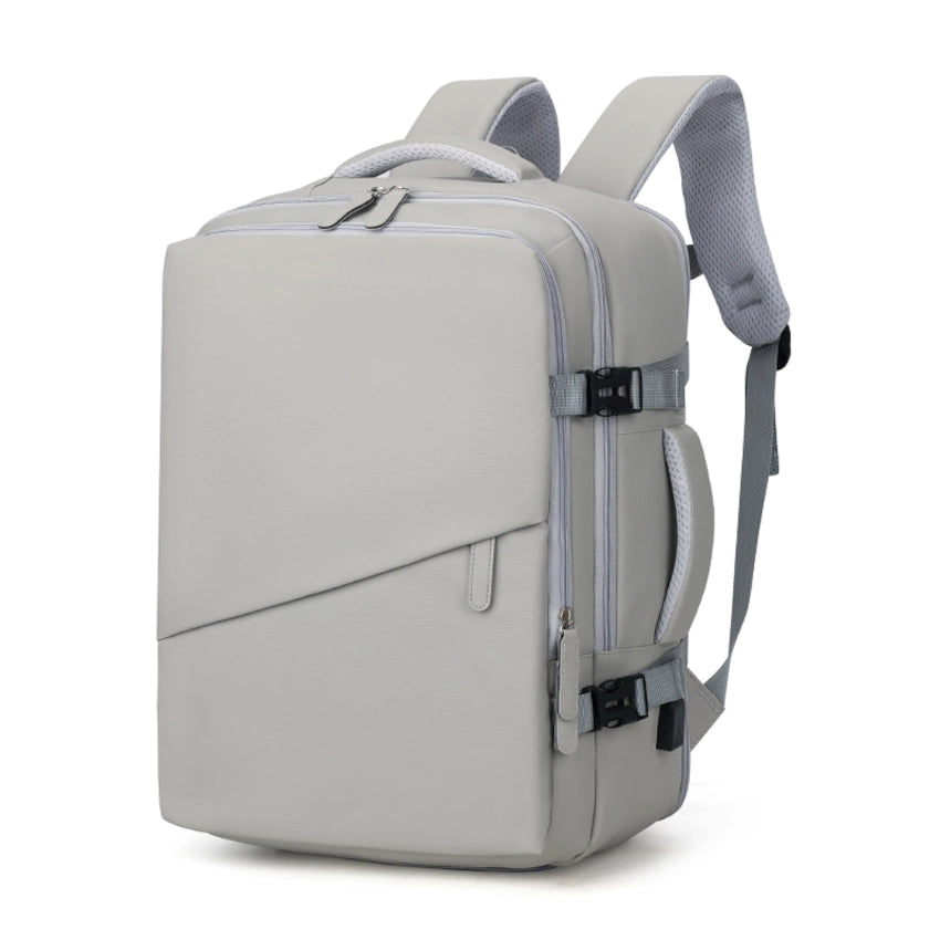 M-Link 15.6" Multi-compartment backpack with padded straps and handles in beige side view showing the zip compartments and the usb charging port. 