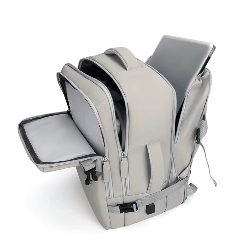 M-Link 15.6" Multi-compartment backpack with padded straps and handles in beige open view showing the compartments